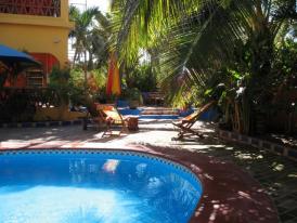 Mexico Resorts - Enjoy ambiance of the tropical gardens and pool at El Palmar, your Mexico Resort.